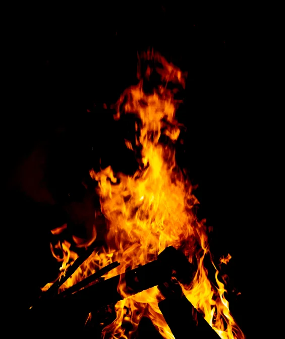 Private bonfire crackling beside a dome
